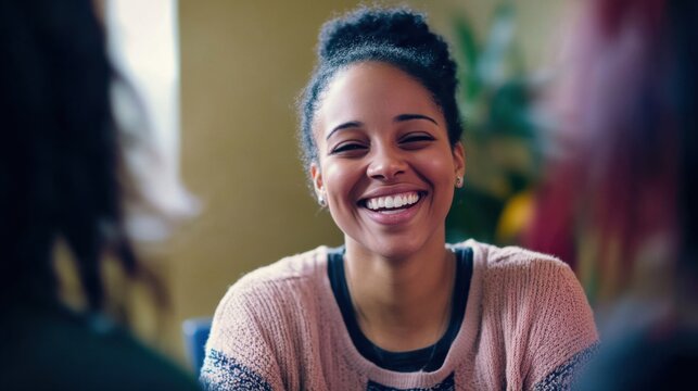 The smile of a social worker facilitating a support group for survivors of domestic violence, symbolizing empowerment and community healing, photography style