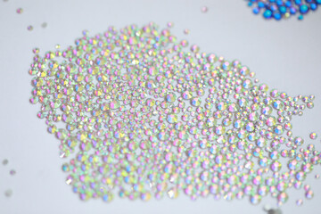 Background precious sparkling multicolored rhinestones. abstract composition