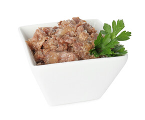 Canned meat and parsley in bowl isolated on white
