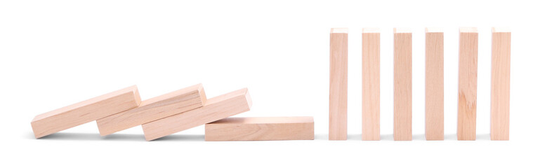 Domino effect. Wooden blocks falling on white background
