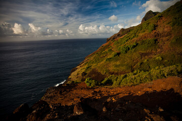 View of beautiful island hills, mountain and ocean at sunset