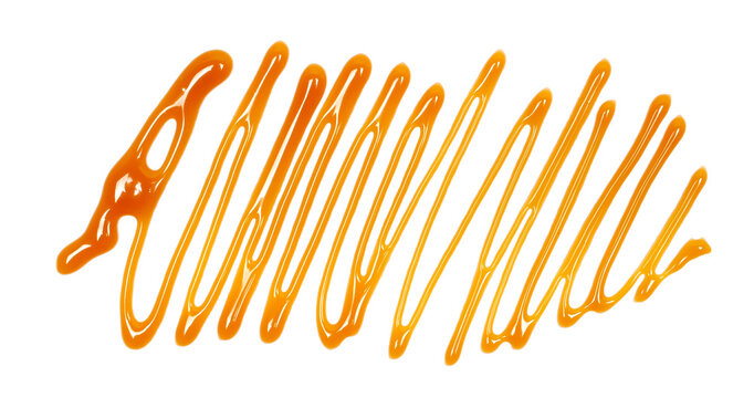 Dessert sauce, caramel flavored topping isolated on white