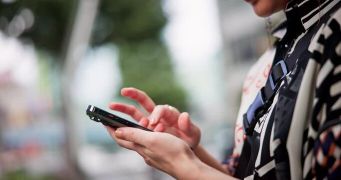 Outdoor, hands and person with cellphone, scroll and internet with social media, chat and app. Japan, mobile user and smartphone with network, message to contact or tech with email and communication