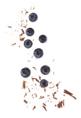 Fresh blueberries and crushed chocolate pieces isolated on white