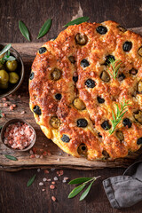 Hot focaccia made of flour, olives, salt and oil.