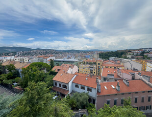 Obraz premium Trieste, Italy - June 27, 2024: Historic San Giusto castle. Cityscape looking out from ramparts