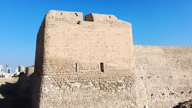 A northern wall and watchtowers of Bahrain Fort, a 16th-century Portuguese fort 