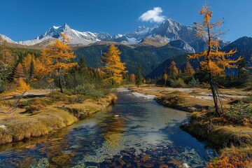 Naklejka premium Small trees by mountain river create serene natural landscape.