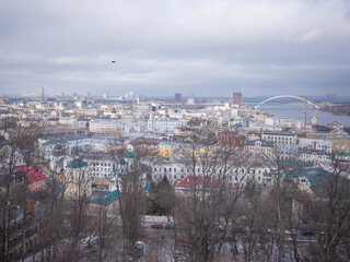 winter cityscape of podil from the hill in capital kyiv