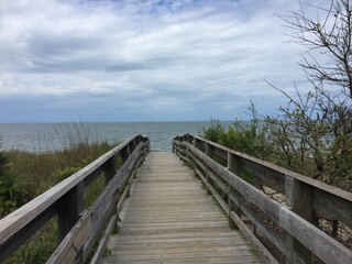 Fototapeta premium Wooden walk to the beach