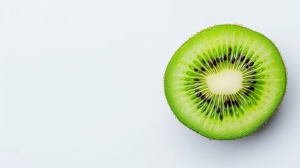 A stunning closeup of a kiwi slice showcases its vibrant green color and delicate texture, perfect for art lovers.