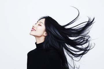 Naklejka premium ロングヘアを風になびかせる女性