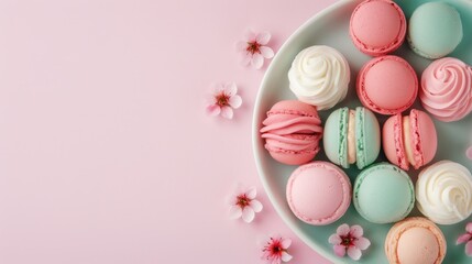 Obraz premium Colorful macarons and whipped cream on a plate.