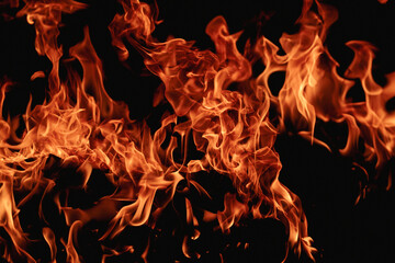 Abstract blaze fire flame texture for banner background. Fire flames on black background. Fire...