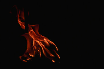 Abstract blaze fire flame texture for banner background. Fire flames on black background. Fire flame texture. Blaze flames background with copy space. Burning fire concept. © Korneliia