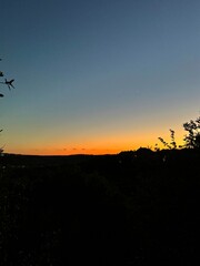Image of sunset from a balcony in Texas