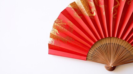 Bright red paper fan with gold dragon pattern, neatly arranged on white background.