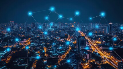 Fototapeta premium A cityscape at night with digital network connections illustrated.