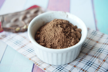 coco powder in a bowl on table,