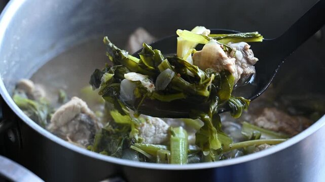 Northern Thai food (Pak Kad Jor), Sour soup Thai flowering bok choy with pork, Homemade cooking