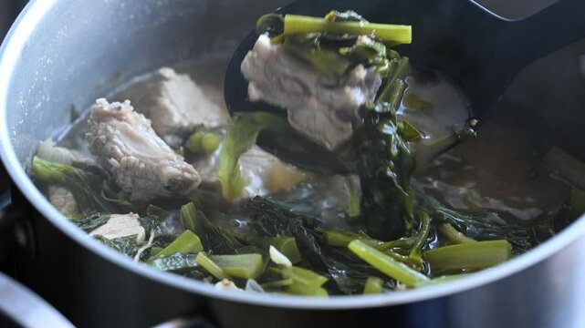 Northern Thai food (Pak Kad Jor), Sour soup Thai flowering bok choy with pork, Homemade cooking