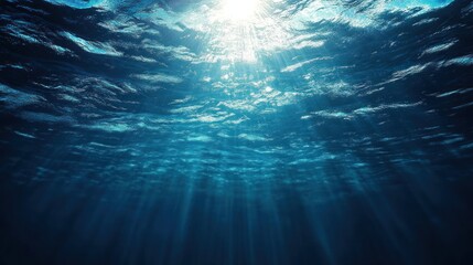 Serene underwater scene with sunlight filtering through the surface.