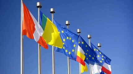 Flags of nations waving in unison international venue photography clear sky wide angle global unity concept