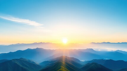 Fototapeta premium The sun is setting over the mountains, casting a warm glow over the landscape