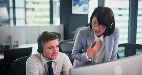Call center, help and leader with man on computer for support, coaching and advice. People, woman teaching or manager talking to consultant agent telemarketing sales for training or script in Japan