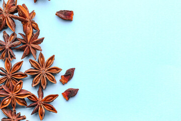 Composition with aromatic star anise spice on color background