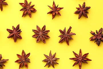 Composition with aromatic star anise spice on yellow background