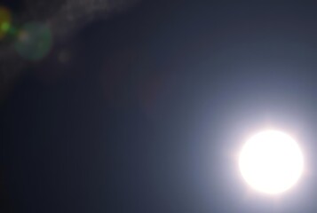 Solar Eclipse with a Glory A solar eclipse that occurs when a gl