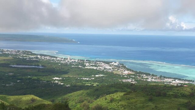 Aerial footage of Saipan, with Lake Susupe and Tinian island in the distance.
