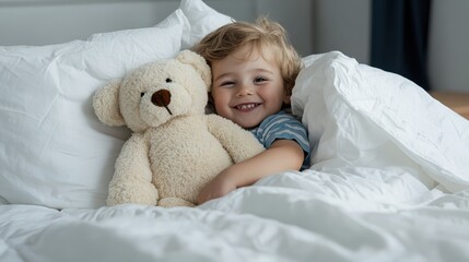 A cheerful child cuddles a teddy bear, enveloped in sunlit warmth and tucked under cozy blankets, radiating happiness and comfort.