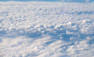 Clouds at the sky. Cloudscape - Blue sky and white clouds. Beautiful blue sky background with clouds. White fluffy clouds in the blue sky. Blue sky and white clouds of daytime