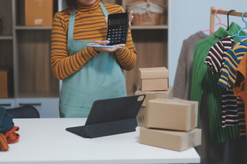 vlogger, blogger small SME business asian beautiful woman using mobile phone video call for sell...