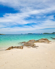 Explore the serene beauty of Samae San Island in Thailand under a clear blue sky