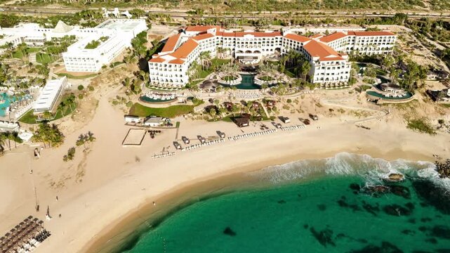 Hilton Los Cabos Beach and Golf Resort in Cabo San Lucas Mexico near San Jos&eacute; del Cabo aerial view flying away shot.