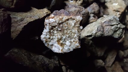 Quartz Rock Formation with Crystals in a Dark Cave Setting