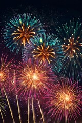 Abstract colored fireworks background with beautiful fireworks lighting up the night sky. Bokeh effect