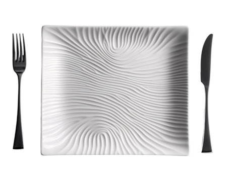 a white plate with a pattern on it and a fork and knife