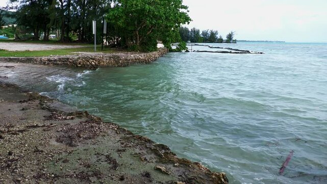 Waves flowing toward the Fishing Base boat dock in Garapan, Saipan