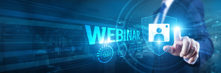 Businessman hand touches a shield, webinar security protection strategy. The concept represents...