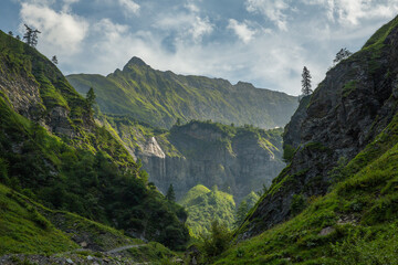 Valley in Alps scenery, Batoni Waterfalls hiking trail in Switzerland