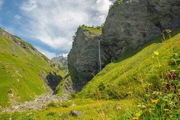 Scenic Piltschinabachfall waterfall in Weisstannen, Switzerland	
