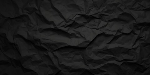 Fototapeta premium Crumpled Black Paper Texture Ideal for Backgrounds and Design Projects in Various Creative Applications