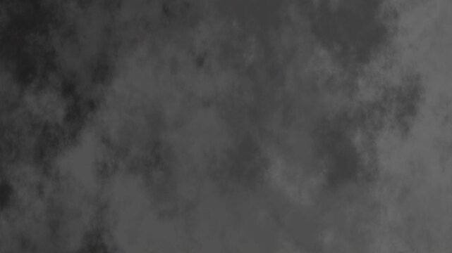 dark gray smoky textured background.