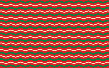 Festive Christmas zigzag pattern featuring alternating red, green, and beige chevron stripes, perfect for holiday-themed designs and wrapping paper.