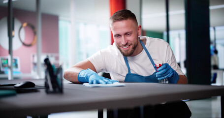 Janitor Cleaning White Desk