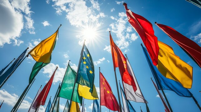 Flag display celebrating global unity international park outdoor event sunny day wide angle cultural significance